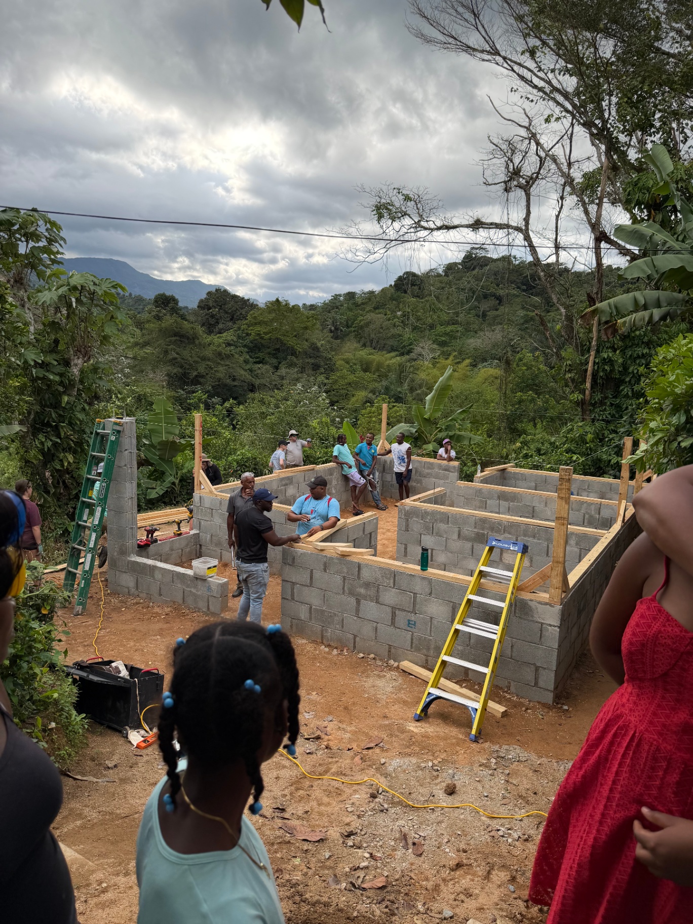 Home construction site surrounded by mountain scenery
