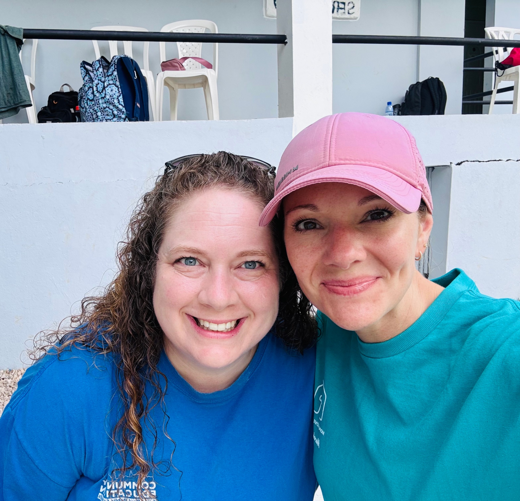 Two volunteers smiling together during the trip